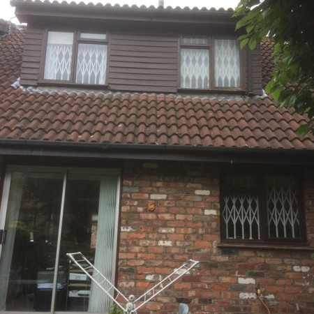 Exterior Property Decorating in Whetstone, all completed on ladders.