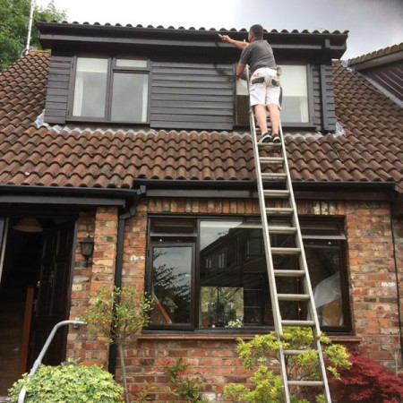 Exterior Property Decorating in Whetstone, all completed on ladders.