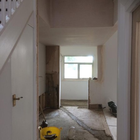 New Kitchen, Muswell Hill, N10. Job included: Lowered ceiling so level, built a level partition to hang the new cabinets, rewiring, down lights, double sockets, tiling and more.