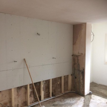 New Kitchen, Muswell Hill, N10. Job included: Lowered ceiling so level, built a level partition to hang the new cabinets, rewiring, down lights, double sockets, tiling and more.