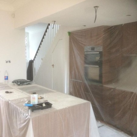 New Kitchen, Muswell Hill, N10. Job included: Lowered ceiling so level, built a level partition to hang the new cabinets, rewiring, down lights, double sockets, tiling and more.