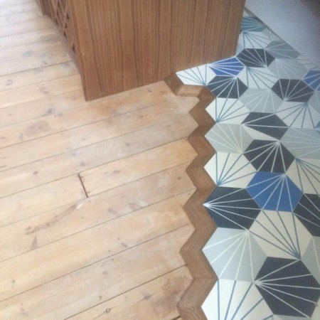 New Kitchen, Muswell Hill, N10. Job included: Lowered ceiling so level, built a level partition to hang the new cabinets, rewiring, down lights, double sockets, tiling and more.