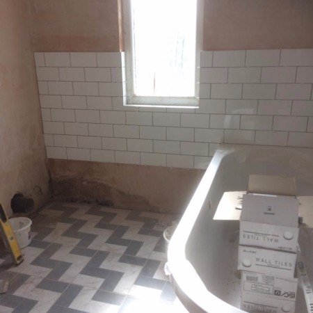 From a separate toilet and bathroom into a modern family bathroom