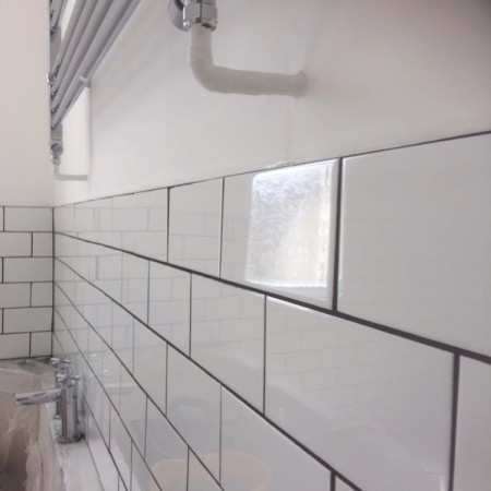 From a separate toilet and bathroom into a modern family bathroom