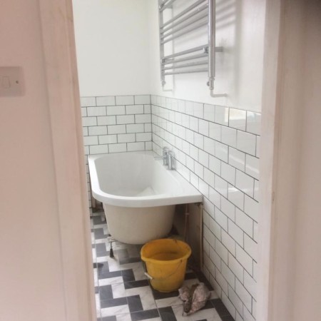 From a separate toilet and bathroom into a modern family bathroom