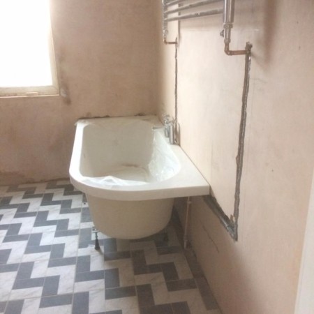 From a separate toilet and bathroom into a modern family bathroom