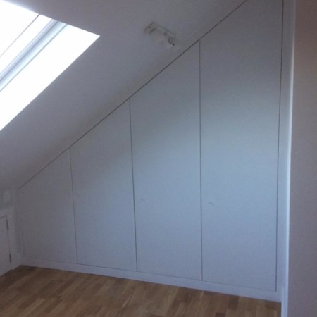 Internal work on a loft conversion including: plaster boarding, plastering, carpentry, painting & MDF inbuilt cupboards - North London