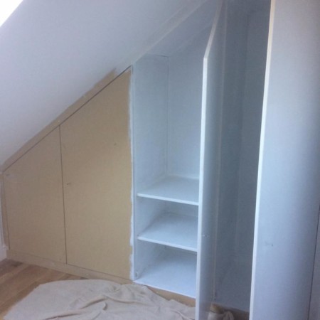 Internal work on a loft conversion including: plaster boarding, plastering, carpentry, painting & MDF inbuilt cupboards - North London