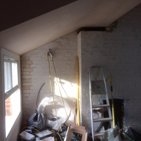 North London loft conversion including: plaster boarding, plastering, carpentry, painting & MDF inbuilt cupboards -