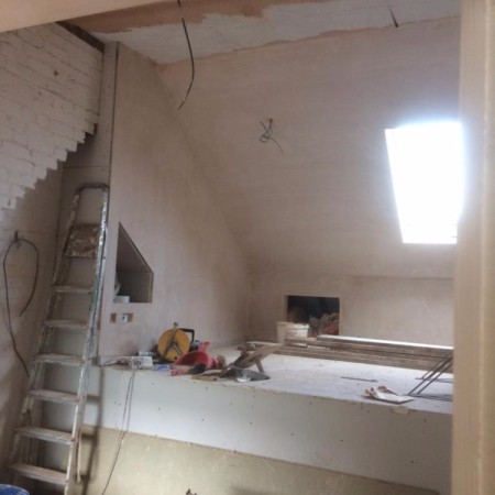 North London loft conversion including: plaster boarding, plastering, carpentry, painting & MDF inbuilt cupboards -