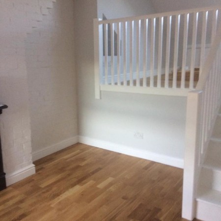North London loft conversion including: plaster boarding, plastering, carpentry, painting & MDF inbuilt cupboards