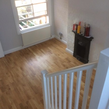 North London loft conversion including: plaster boarding, plastering, carpentry, painting & MDF inbuilt cupboards