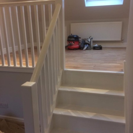 North London loft conversion including: plaster boarding, plastering, carpentry, painting & MDF inbuilt cupboards -