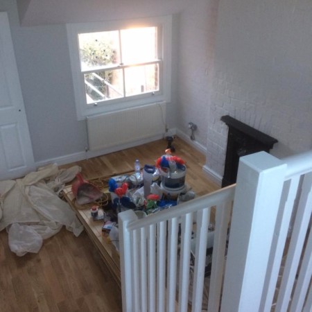 North London loft conversion including: plaster boarding, plastering, carpentry, painting & MDF inbuilt cupboards